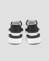 A heel shot of the low-top M-100 white and black sneaker